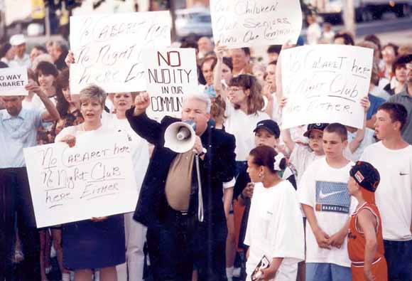 Glenn Devitt leads a community rally against Thee Hideout Bar